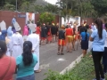 “Station 5” sign is on the wall, left, Simon helps Jesus carry His cross
